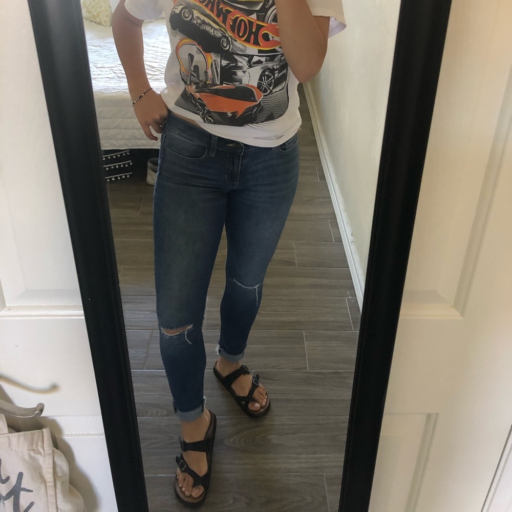 Medium wash denim distressed jeans